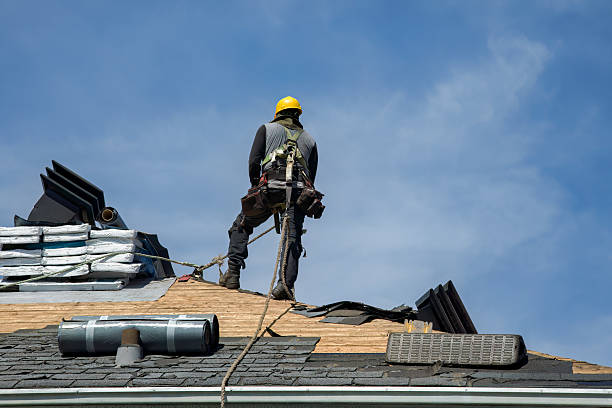 Professional Roofing technician working in Hague, VA
